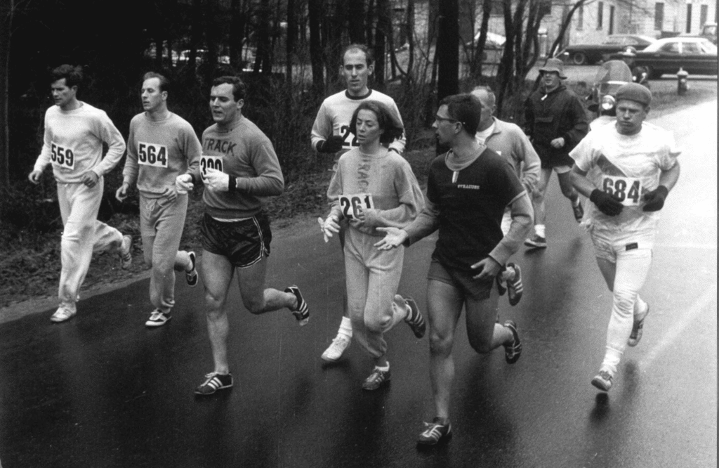 Kathrine Switzer Runs the Boston Marathon alongside other racers